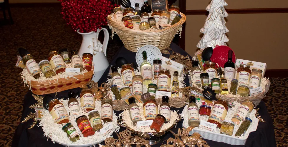 An assortment of Stancato's gift baskets filled with retail products.